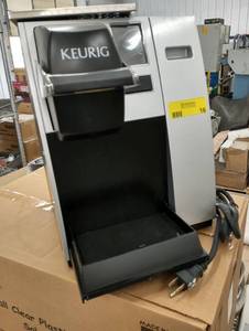 lot 16 image: Used Keurig model K150 - works