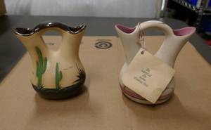 lot 59 image: 2 nice Southwestern pottery wedding vases and one regular vase