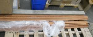 lot 125 image: 15 pcs of 8ft long wood trim  chair rail and 6 pcs of 4