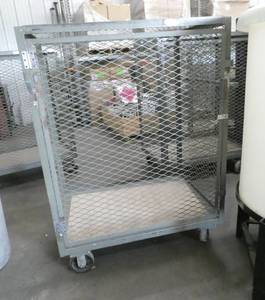 lot 129 image: Warehouse Storage - Rolling Expanded Metal Cage with locking door - measures 30 w x 42 L x 57 tall