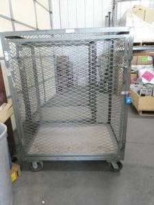 lot 130 image: Rolling Expanded Metal Cage with locking door - measures 30 w x 42 L x 57 tall