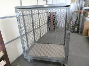 lot 132 image: Rolling Expanded Metal Cage with locking door - measures 30 w x 42 L x 57 tall