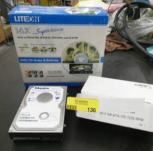 lot 136 image: 2 Maxtor hard drives 60gb and 120gb and a new Liteon CDDVD writer