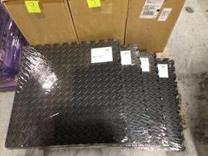 Lot of 4 TrafficMaster Black 24 in. x 24 in. Foam Interlocking Gym Flooring (24 sq. ft.) (6-Pack) see pictures