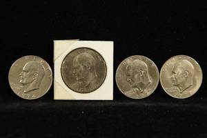 lot 31 image: 4 Eisenhower Dollar Coins