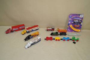 lot 92 image: Toy Semi Trucks and Trains