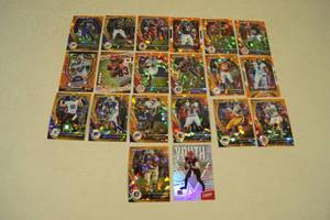 lot 103 image: Panini Prizm Football Cards - Refractors, Rookies, College Jerseys