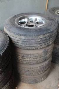 lot 159 image: Lot of (4) Bridgestone V-Steel LT24575R16 Tires with 16 8-Lug Rims