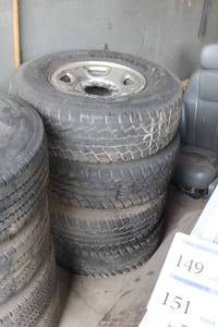 lot 160 image: Lot of (4) Rodian AT II LT26575R16 Tires with 16 8-Lug Rims