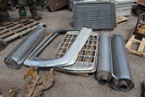 lot 231 image: Semi Tractor Accessories  with Radiator, Grills, Grill Rings, Exhaust Stacks, Exhaust Stack Covers