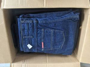 (1) 52-56 Navy Blue Coveralls, (3) 34 x 30 G&K Jeans, (6) 48 x 30 G&K Jeans