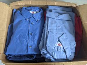 (29) Assorted Work Clothes-(5) Light Blue Small Short Sleeve Button Down Shirts,(5) Red Large Short Sleeve Button Down Shirts,(10) Blue Medium Short Sleeve Button Down Shirts,(4) 30 x 32 Black Pants, (3) XL White Button Down Shirts, (2) 42 x G & K Jeans