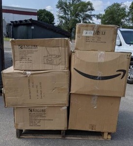 lot 912 image: Pallet BearPaw Boots, RCA Sound System, AVGO System, and So Much More