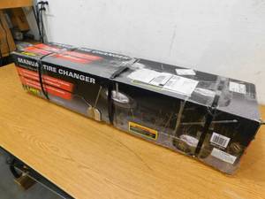 lot 7 image: Larin Manual Tire Changer