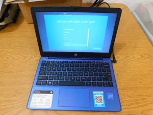 lot 38 image: HP 11.6 HD Intel Celeron 4GB Memory 32GB Hard Drive Windows 10S Laptop Computer  Royal Blue