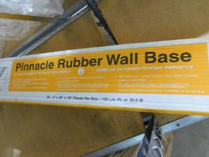 lot 61 image: Rubber Black 4 in. x 18 in. x 48 in. Wall Cove Base (30-Pieces)