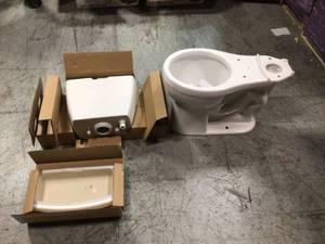 Foundations 2-piece 1.28 GPF Single Flush Round Front Toilet in White by Delta