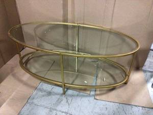 Home Decorators Collection Bella 46 in. Gold LeafClear Large Oval Glass Coffee Table with Shelf Customer Returns See Pictures