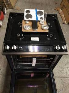 Whirlpool� 6.4 Cu. Ft. Freestanding Electric Range with True ConvectionSlightly Damaged on bottom corner See Pictures