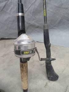 lot 25 image: 2 ZEBCO POLES - 1 WITH ZEBCO REEL