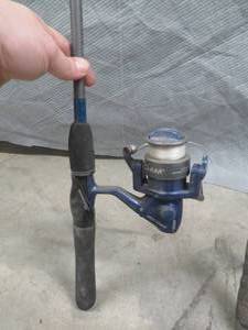 lot 27 image: TWO FISHING RODS - ONE WITH REEL