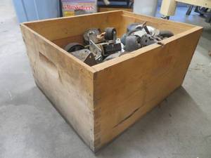 lot 119 image: ANTIQUE DOVETAILED BOX FULL OF CASTOR WHEELS