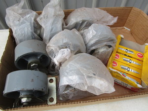 lot 118 image: Steel Casters, Spark Plugs