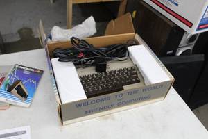lot 757 image: Commodore 64 Expandable Computer System (in original packaging)  with Computer Program and Game Cartridges and Discs