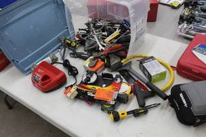 lot 737 image: Lot of Hand Tools (in plastic bin)  - Combination Wrenches, Crescent Wrenches, Wire Cutter, Scraper, Tape Measure, Master Lock with Key, Milwaukee M12 Charger, RTV Cord, Pliers, Misc. Tools and Hardware