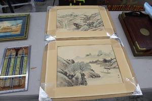 lot 791 image: Lot of (2) Oriental Landscape of Mountains and Water Subtle Colored Wall Art circa 1940s (signed, stamped, matted, unframed, in original packaging)