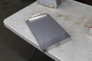lot 798 image: Metal Box Clipboard  with Tape Measure, Screwdriver, Pens
