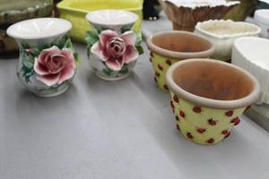 lot 868 image: Lot of (4) Handcrafted Ornate PlantersVases
