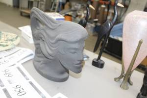 lot 949 image: Man Face Statue