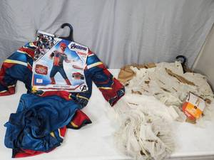 lot 129 image: 2 New Kids Large Costumes