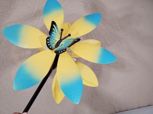 lot 85 image: New Double Wind Spinner with Solar Light