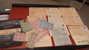 lot 55 image: 12 WWII Ration books, stamps and more