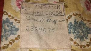 lot 100 image: American Red Cross WWI bag & military bag.