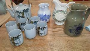 lot 130 image: Pottery Tea set and 3 pitchers, Miora.