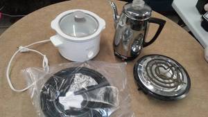 lot 587 image: Electric hot plate, crock, coffee pot and more.