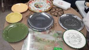 lot 588 image: New Cutting board, trivet, platters, and more.