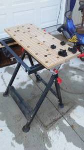 lot 213 image: Work mate stand up work table  clamp.