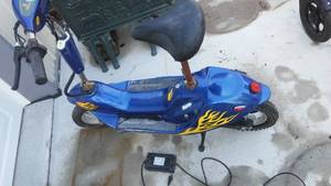 lot 214 image: Terminator Electric Scooter