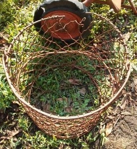 lot 221 image: Potato basket.