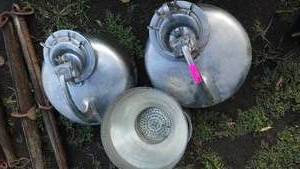 lot 225 image: Stainless steel milking machine parts.