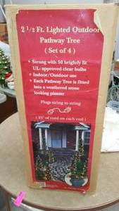 lot 190 image: Set of 4 Lit Christmas trees.