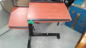 lot 792 image: Adjustable rolling desktop  very versatile