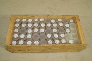 lot 37 image: Wood Crate of Quarter Storage Tubes