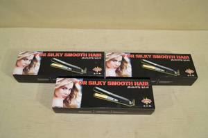 lot 43 image: 3 Unused Hair Straightening Irons