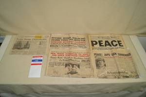 lot 97 image: 4 WWII Ending Newspapers - Souvenir Peace Agreement Copy