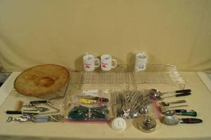 lot 148 image: Kitchen Items - Pampered Chef Pizza Stone, Racks, Flatware